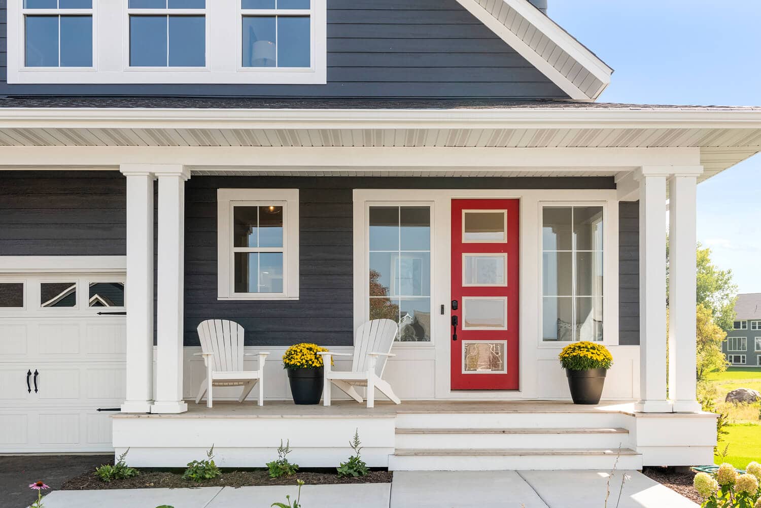 Blue painted home with red front door
